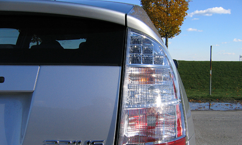 Driving a Prius might reduce your carbon footprint, but by how much? Online calculators disagree. [Image credit: Beige Alert, Flickr.com]
